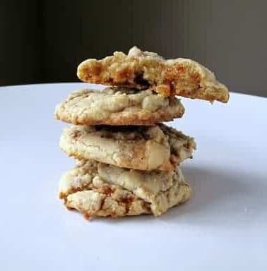 Stack of Toffee Bit Cookies on white background