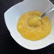 Lemon Cake Filling in a white bowl on black background