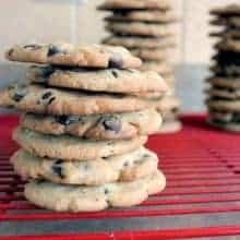 Stacks of Chocolate Chip Cookie in red cooling rack