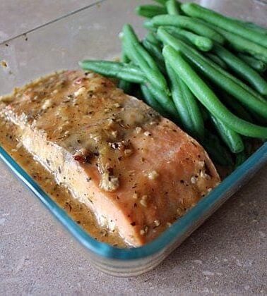 Close up of Salmon & Green Beans in a glass container