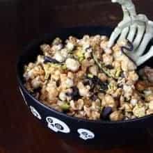 Buggy Caramel Popcorn in spooky black bowl