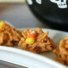 close up hardened Candy Corn Haystacks in white rectangular plate