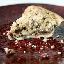 A Slice of Apple Oatmeal Crumble Pie in a Red Plate