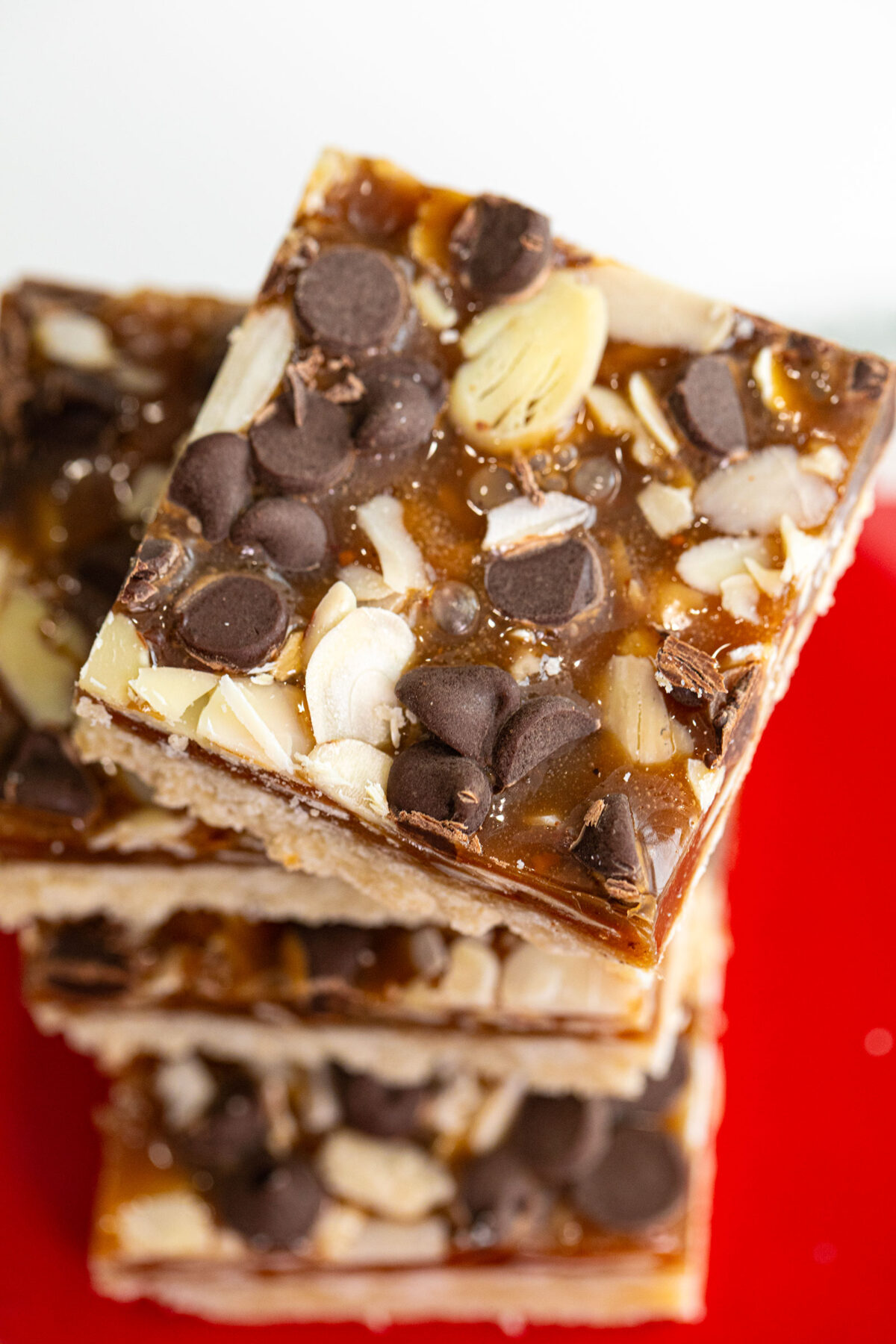 close up of almond crunch toffee bars sliced into squares.