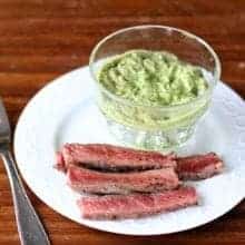 BBQ Steak & Horseradish Guacamole in a white plate with fork on the side