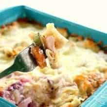 close up a fork with Vegetable & Cheese Tortellini from Casserole on white background