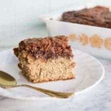 Chocolate Peanut Butter Banana Cake in a small white plate and in a baking pan