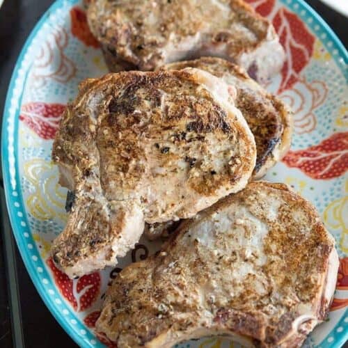 Lemon Herb Grilled Pork Chops Recipe - The Kitchen Magpie