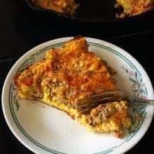 close up of a Slice of Leftover Meatloaf Quiche on a Corelle plate