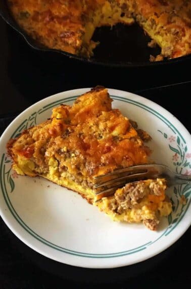 close up of a Slice of Leftover Meatloaf Quiche on a Corelle plate