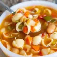 Minestrone Soup bowl topped with a sprinkle of Parmesan