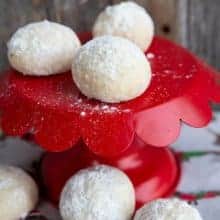 close up Pecan Sandies in a red cake holder