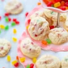 close up Gumdrop Cookies in a 3 layer pink cupcake stand