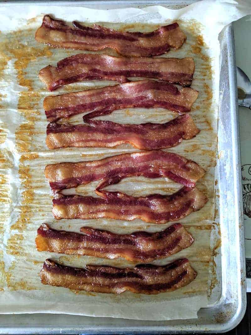 https://www.thekitchenmagpie.com/wp-content/uploads/images/2019/05/HowToMakeBaconintheOven1.jpg