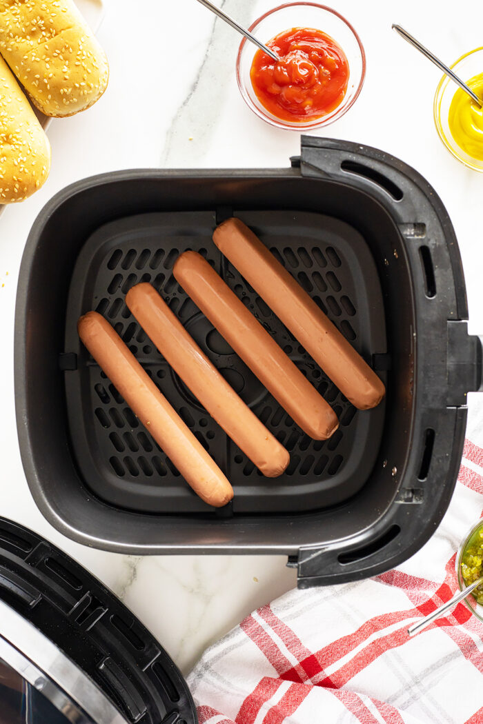 airfryer hot dogs in teh air fryer basket
