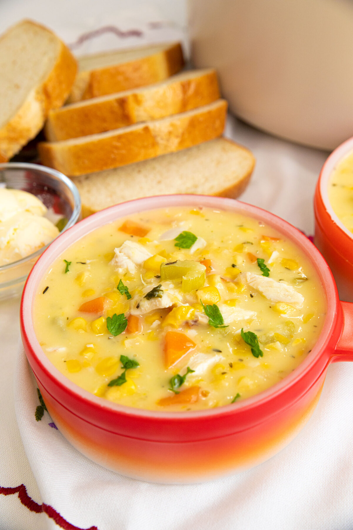 a big bowl of chicken and corn soup