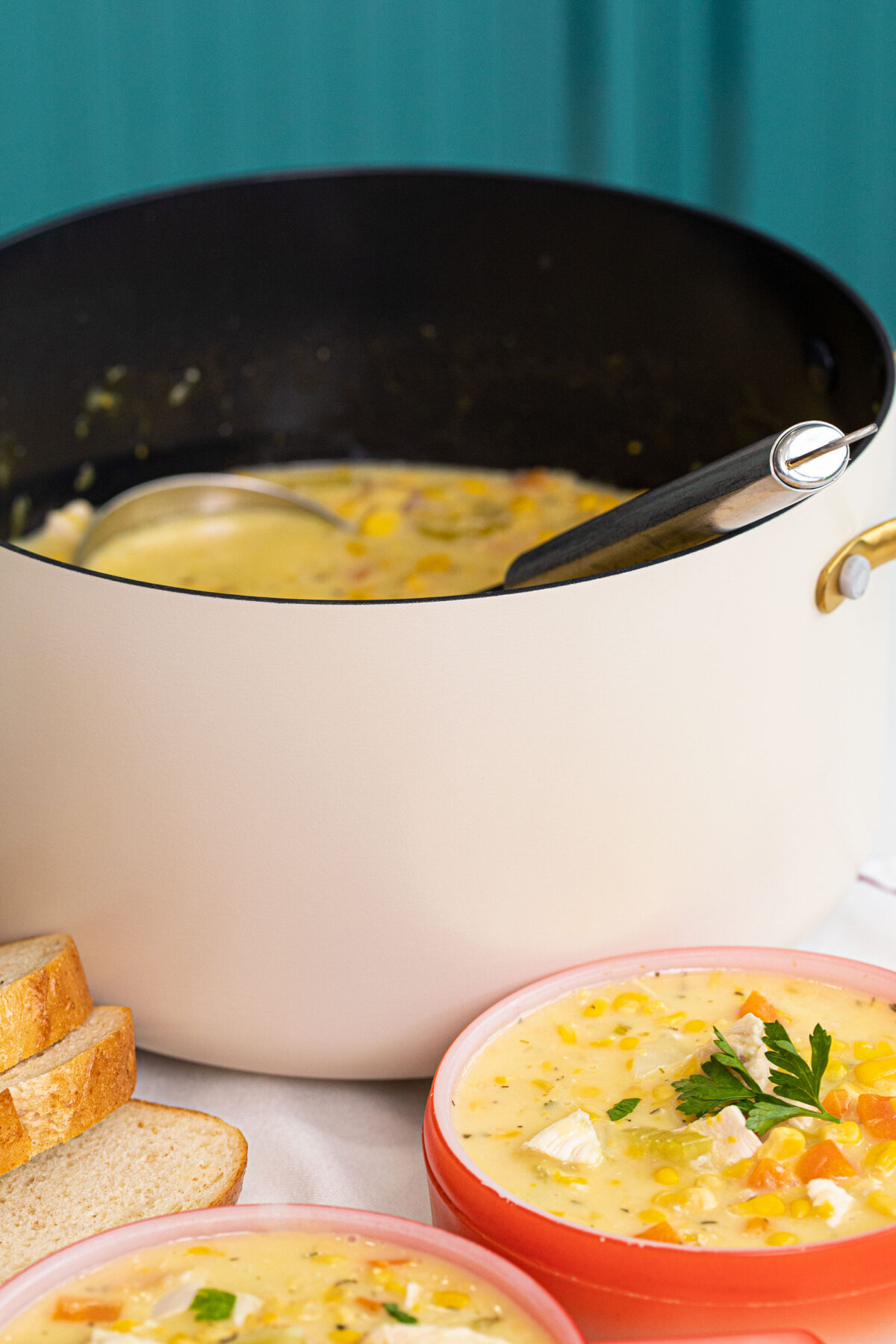 a pot of chicken corn soup