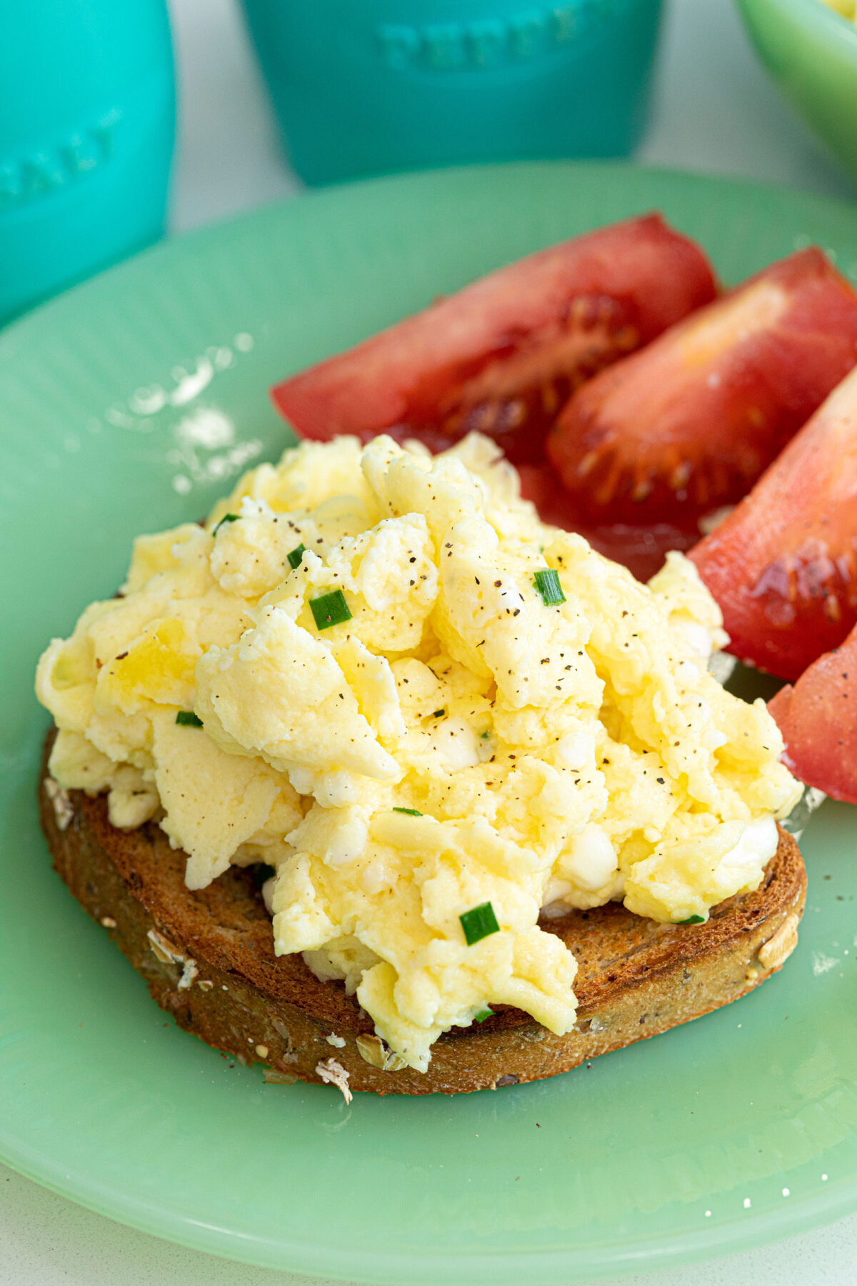 scrambled eggs with cottage cheese on a plate 