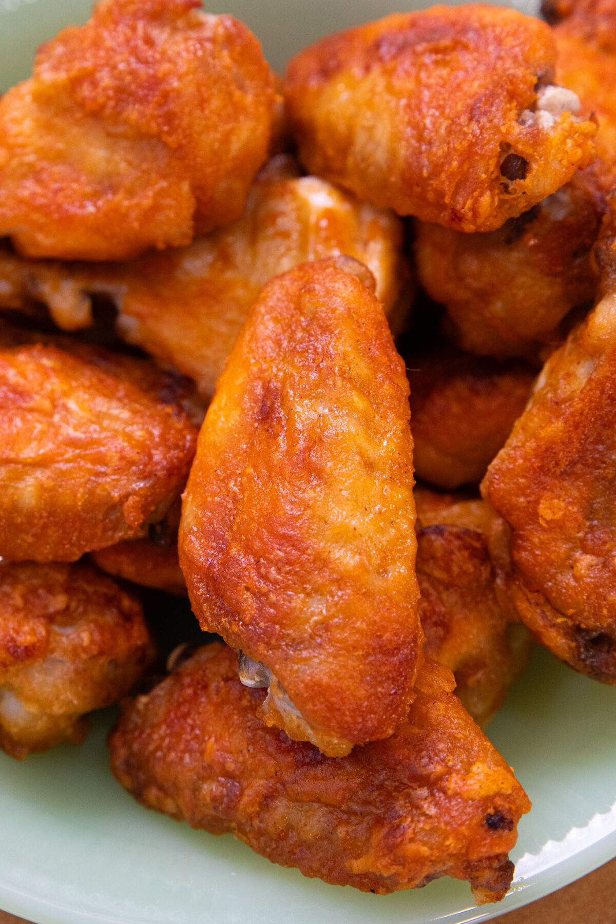 close up of baked buffalo wings