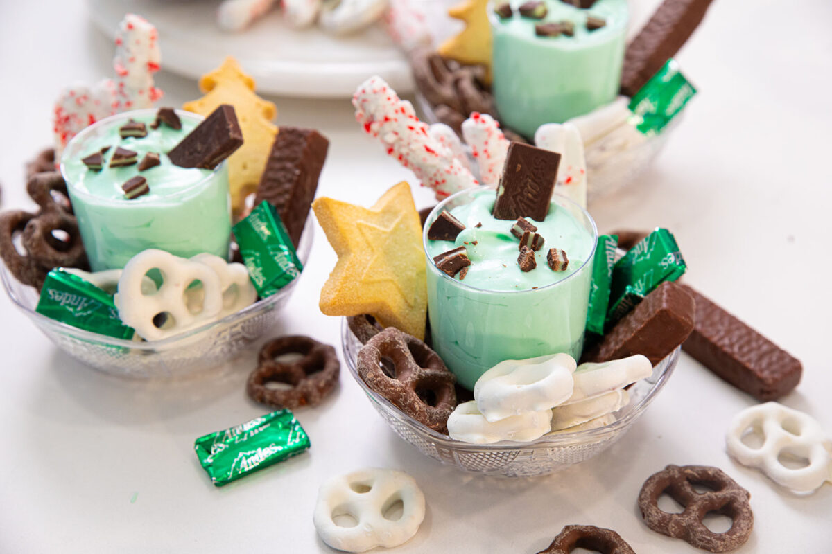 tipsy grasshopper dessert dip in cups with cookies and chocolates